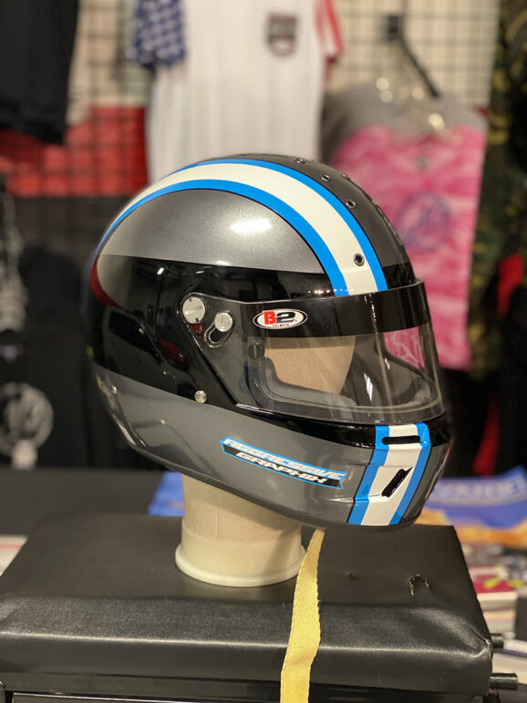 Custom car racing helmet wrap on black gloss helmet